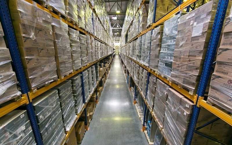 Tile and tiling supplies racked by pallet in the Inspiring Tiles warehouse